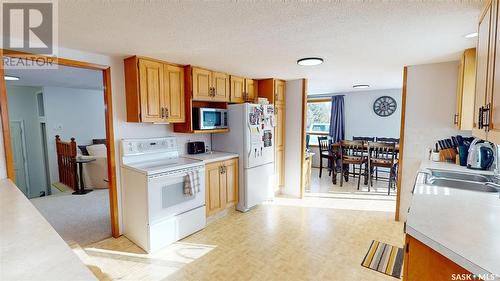 108 Anne Street, Wawota, SK - Indoor Photo Showing Kitchen With Double Sink