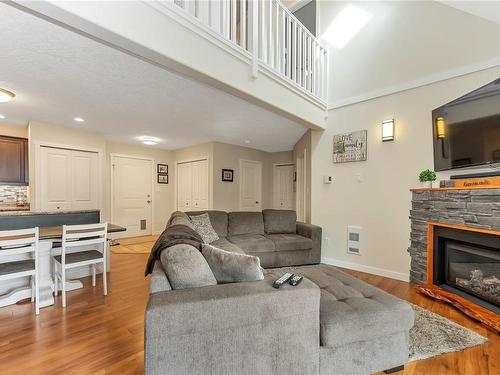 1873 Taylor Walk, Qualicum Beach, BC - Indoor Photo Showing Living Room With Fireplace