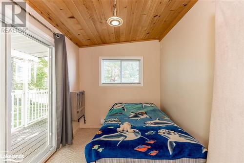 Bedroom 3 w/ Walkout - 36 Yellowhead Island, Port Severn, ON - Indoor Photo Showing Bedroom