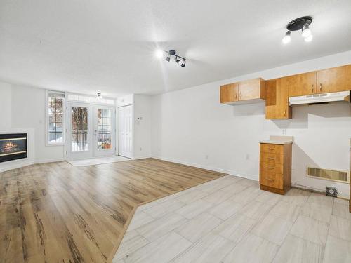Overall view - A-325 Rue Champlain, Gatineau (Hull), QC - Indoor With Fireplace
