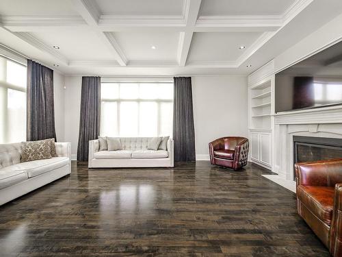 Family room - 401 Av. Des Crécerelles, Beaconsfield, QC - Indoor Photo Showing Living Room With Fireplace