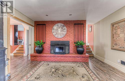 7 Squire Court, Waterloo, ON - Indoor With Fireplace
