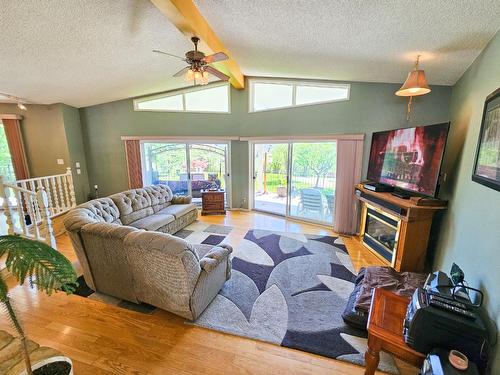 1392 Relkoff Road, Castlegar, BC - Indoor Photo Showing Living Room With Fireplace