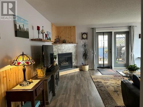 256 Vanderview Drive, Vanderhoof, BC - Indoor Photo Showing Living Room With Fireplace