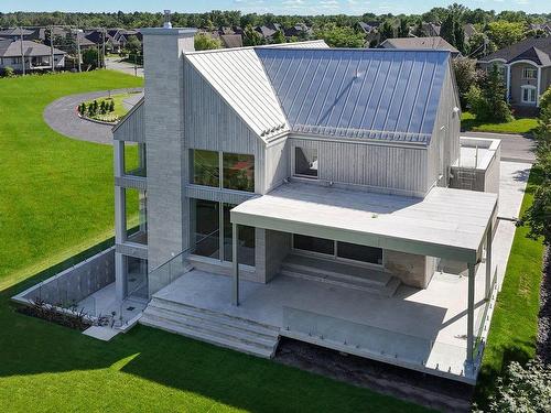 Back facade - 4010 Rue De La Fougère, Saint-Bruno-De-Montarville, QC - Outdoor With Deck Patio Veranda