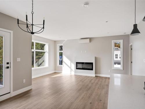 102-2110 Triangle Trail, Langford, BC - Indoor Photo Showing Living Room With Fireplace