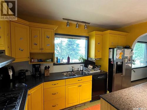 502 1St Street W, Meadow Lake, SK - Indoor Photo Showing Kitchen With Double Sink