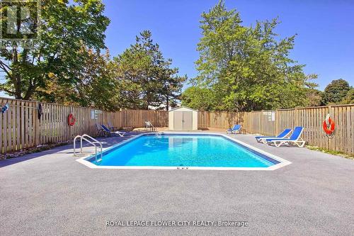 #505 -6720 Glen Erin Dr, Mississauga, ON - Outdoor With In Ground Pool With Backyard