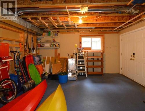 Lower level workshop with walkout - 357 Clear Lake Lane 11 Road, Maberly, ON - Indoor Photo Showing Basement