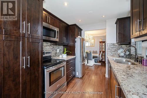 1705 - 26 Hanover Road, Brampton, ON - Indoor Photo Showing Kitchen With Double Sink With Upgraded Kitchen