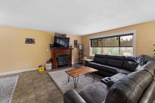 144 Chase Rd, Christina Lake, BC - Indoor Photo Showing Living Room With Fireplace