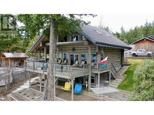3764 Emerald Crescent, Lac La Hache, BC - Outdoor With Body Of Water With Deck Patio Veranda With View