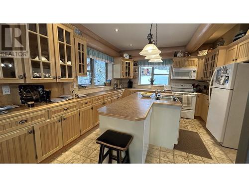 3764 Emerald Crescent, Lac La Hache, BC - Indoor Photo Showing Kitchen With Double Sink
