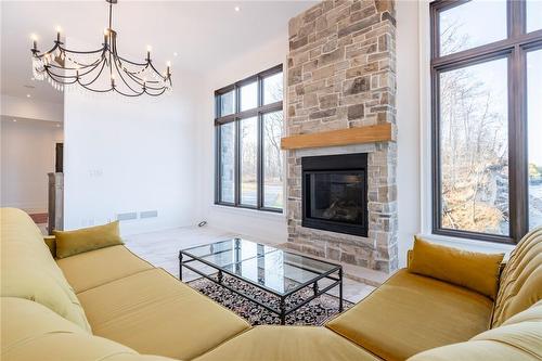 1250 Lakeshore Road W, St. Catharines, ON - Indoor Photo Showing Living Room With Fireplace