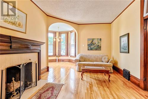 80 Munroe Avenue E, Renfrew, ON - Indoor Photo Showing Living Room With Fireplace