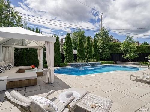 Cour - 32 Rue Du Chambertin, Kirkland, QC - Outdoor With In Ground Pool With Deck Patio Veranda With Backyard