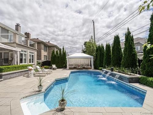 Cour - 32 Rue Du Chambertin, Kirkland, QC - Outdoor With In Ground Pool With Backyard