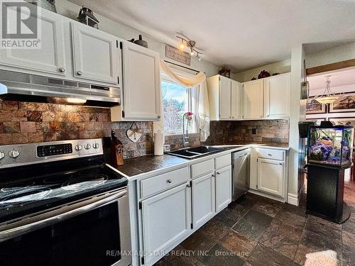 1057 Base Line Rd, Kawartha Lakes, ON - Indoor Photo Showing Kitchen With Double Sink