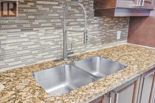 311 - 39 Ferndale Drive S, Barrie, ON - Indoor Photo Showing Kitchen With Double Sink