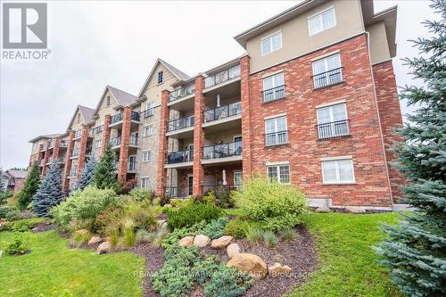 #311 -39 Ferndale Dr S, Barrie, ON - Outdoor With Balcony With Facade