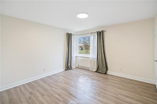 Main floor primary bedroom - 19 Fawell Avenue, St. Catharines, ON - Indoor Photo Showing Other Room