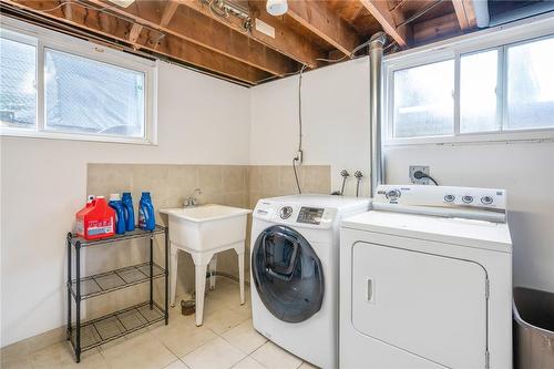 Clean and tidy shared laundry room - 19 Fawell Avenue, St. Catharines, ON - Indoor Photo Showing Laundry Room