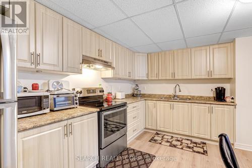 19 Treeline Blvd, Brampton, ON - Indoor Photo Showing Kitchen With Double Sink