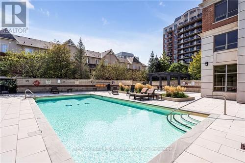 #209 -2391 Central Park Dr, Oakville, ON - Outdoor With In Ground Pool
