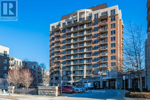 #209 -2391 Central Park Dr, Oakville, ON - Outdoor With Balcony With Facade