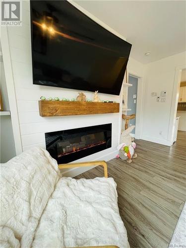 5 Bancroft Point Road, Grand Manan, NB - Indoor Photo Showing Living Room With Fireplace