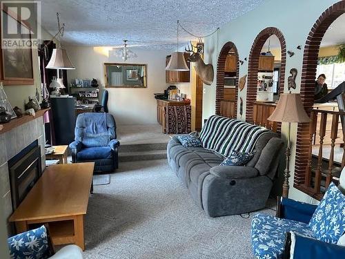 5309 Mcleod Road, Vanderhoof, BC - Indoor Photo Showing Living Room With Fireplace