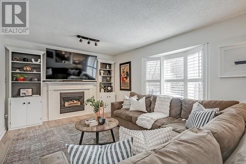 2424 Raymore Dr, Burlington, ON - Indoor Photo Showing Living Room With Fireplace