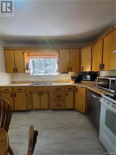 6777 Route 107, Juniper, NB - Indoor Photo Showing Kitchen With Double Sink