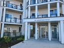 #129 -50 Lakebreeze Dr, Clarington, ON  - Outdoor With Balcony With Facade 