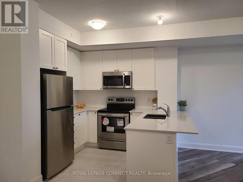 #129 -50 Lakebreeze Dr, Clarington, ON - Indoor Photo Showing Kitchen With Stainless Steel Kitchen With Double Sink