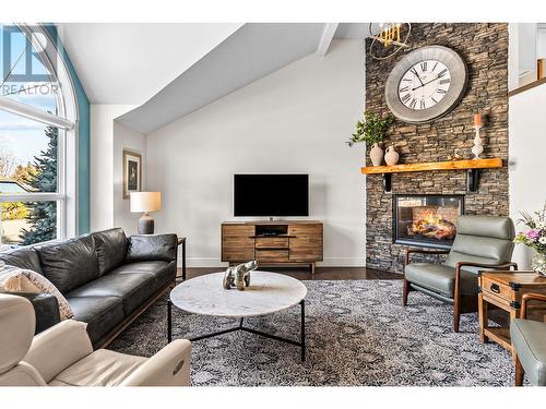 321 Rio Drive S, Kelowna, BC - Indoor Photo Showing Living Room With Fireplace