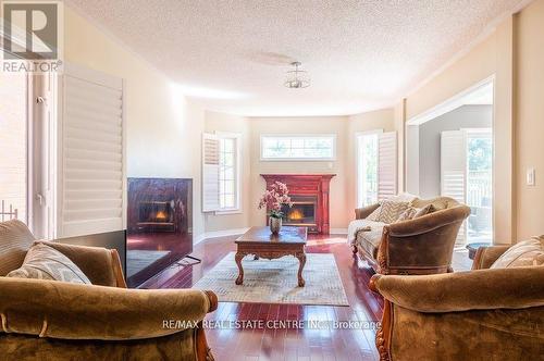 925 Knotty Pine Grove, Mississauga, ON - Indoor Photo Showing Living Room With Fireplace