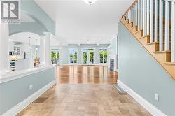 Large inviting foyer with gorgeous view of Stoco Lake. - 