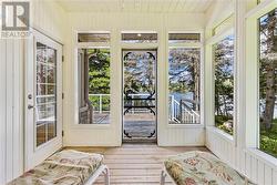 Private screened in porch off of Primary bedroom. - 