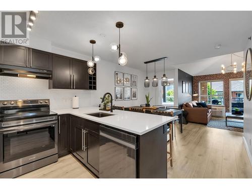 1093 Sunset Drive Unit# 401, Kelowna, BC - Indoor Photo Showing Kitchen With Upgraded Kitchen