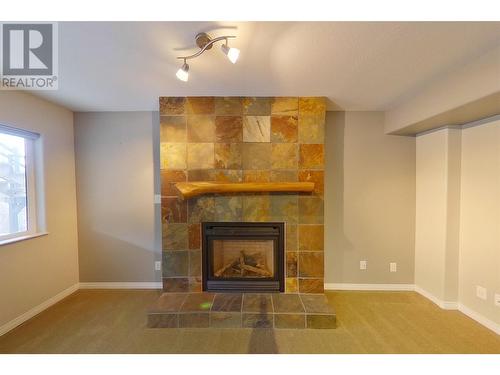 4801 13 Street Ne, Salmon Arm, BC - Indoor Photo Showing Other Room With Fireplace