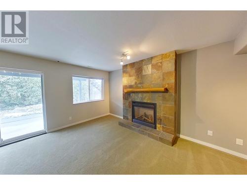 4801 13 Street Ne, Salmon Arm, BC - Indoor Photo Showing Living Room With Fireplace