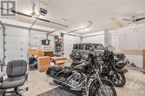 Garage currently under one year lease as storage - 568 Limoges Road, Limoges, ON - Indoor Photo Showing Garage