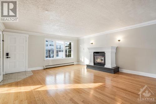 269-271 Kipling Square, Hawkesbury, ON - Indoor Photo Showing Living Room With Fireplace