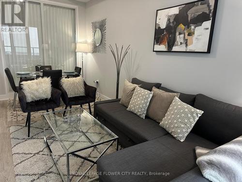 225 - 30 Shore Breeze Drive, Toronto, ON - Indoor Photo Showing Living Room