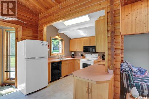 708 Tatanka Drive, Buffalo Pound Lake, SK - Indoor Photo Showing Kitchen With Double Sink