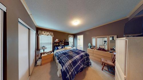 12 Pinewood Avenue Nw, Cranbrook, BC - Indoor Photo Showing Bedroom