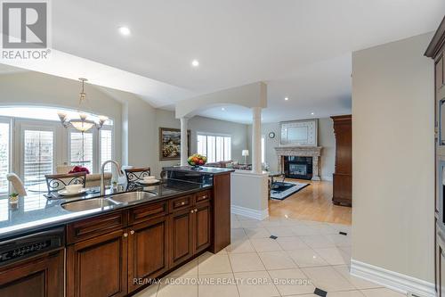 2343 Darlington Tr, Oakville, ON - Indoor Photo Showing Kitchen With Fireplace With Double Sink
