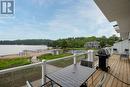 A203204 - 1869 Highway 118 Road W, Bracebridge, ON  - Outdoor With Body Of Water With Deck Patio Veranda With View With Exterior 