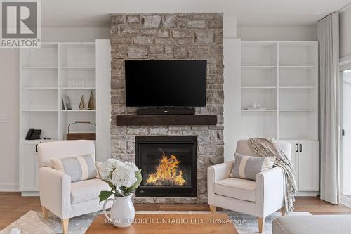 A203204 - 1869 Highway 118 Road W, Bracebridge, ON - Indoor Photo Showing Living Room With Fireplace